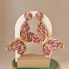 pendiente mariposa yute